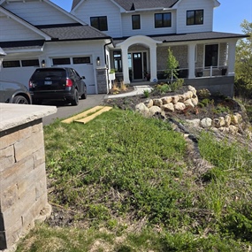 Front yard native planting and erosion control landscaping at an Eden Prairie residence