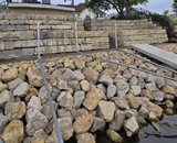 Riprap shoreline stabilization and retaining wall in Champlin, MN